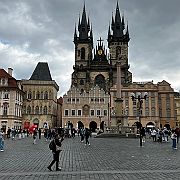 In the 11th century, the Old Town plaza area was occupied by a Romanesque church, which was built for foreign merchants coming to the nearby Týn Courtyard.  
   It was replaced by an early Gothic Church of Our Lady before Týn in 1256. The church became the center of the German inhabitants of Prague's Old Town